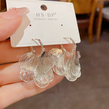 Retro Exaggerated Metal Silver Hollow Ginkgo Leaf Earrings