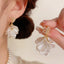 Diamond Studded White Petal Tassel Earrings