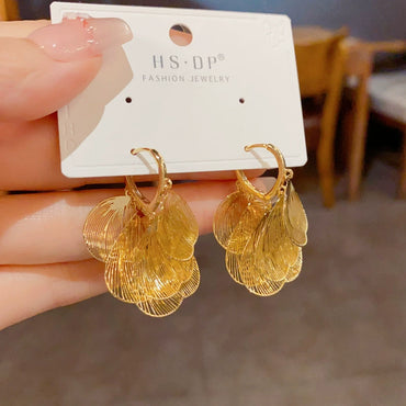 Retro Exaggerated Metal Golden Hollow Ginkgo Leaf Earrings