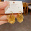 Retro Exaggerated Metal Golden Hollow Ginkgo Leaf Earrings