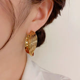 Exaggerated Twisted Metal Ear Loops