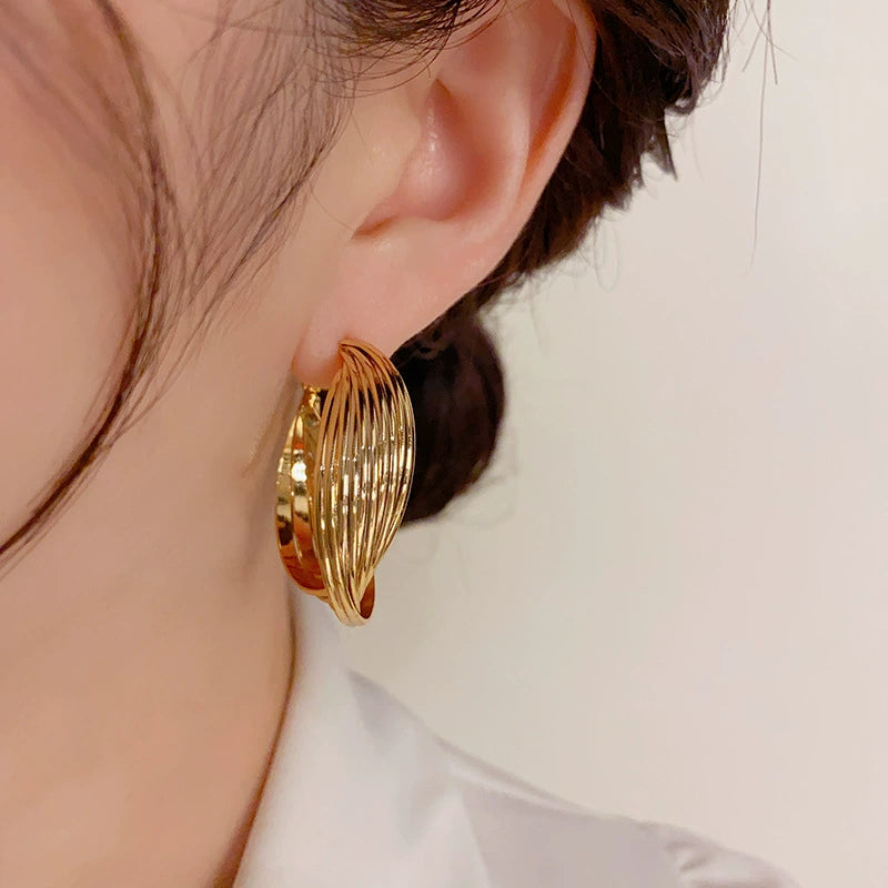 Exaggerated Twisted Metal Ear Loops