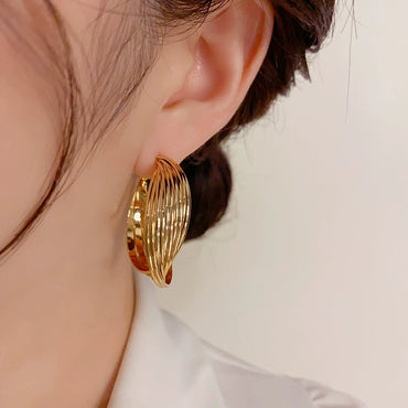 Exaggerated Twisted Metal Ear Loops