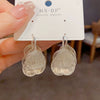 Retro Exaggerated Metal Silver Hollow Ginkgo Leaf Earrings