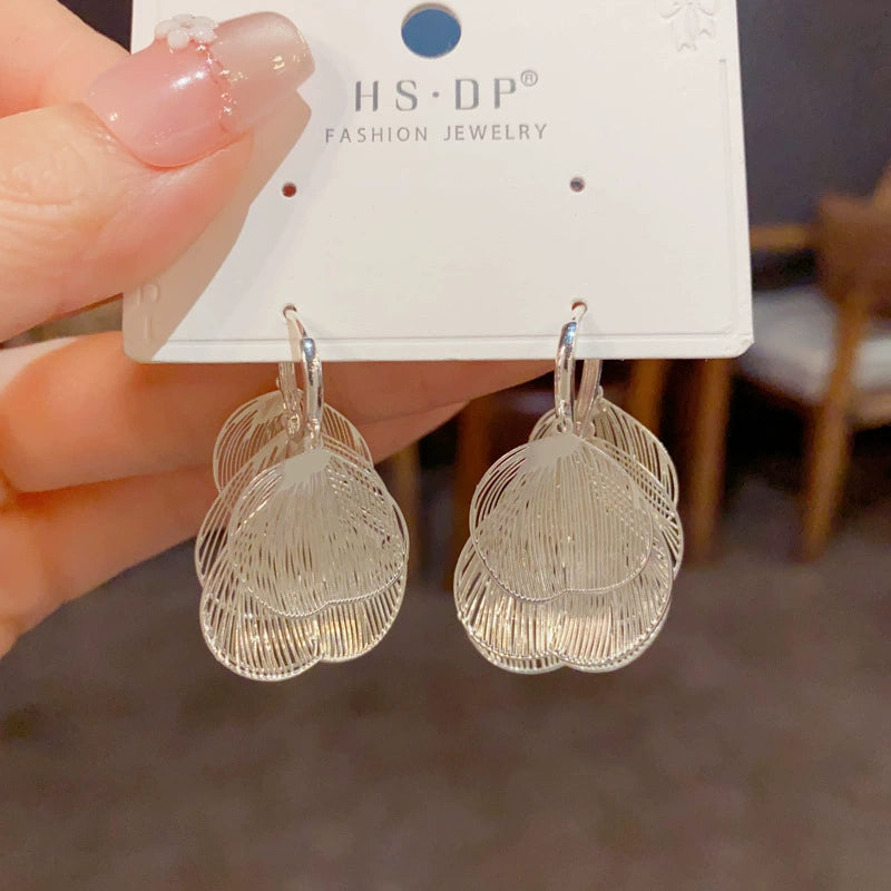 Retro Exaggerated Metal Silver Hollow Ginkgo Leaf Earrings