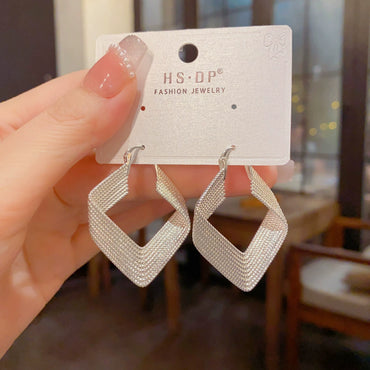 Silver Exaggerated Metal Diamond Earrings